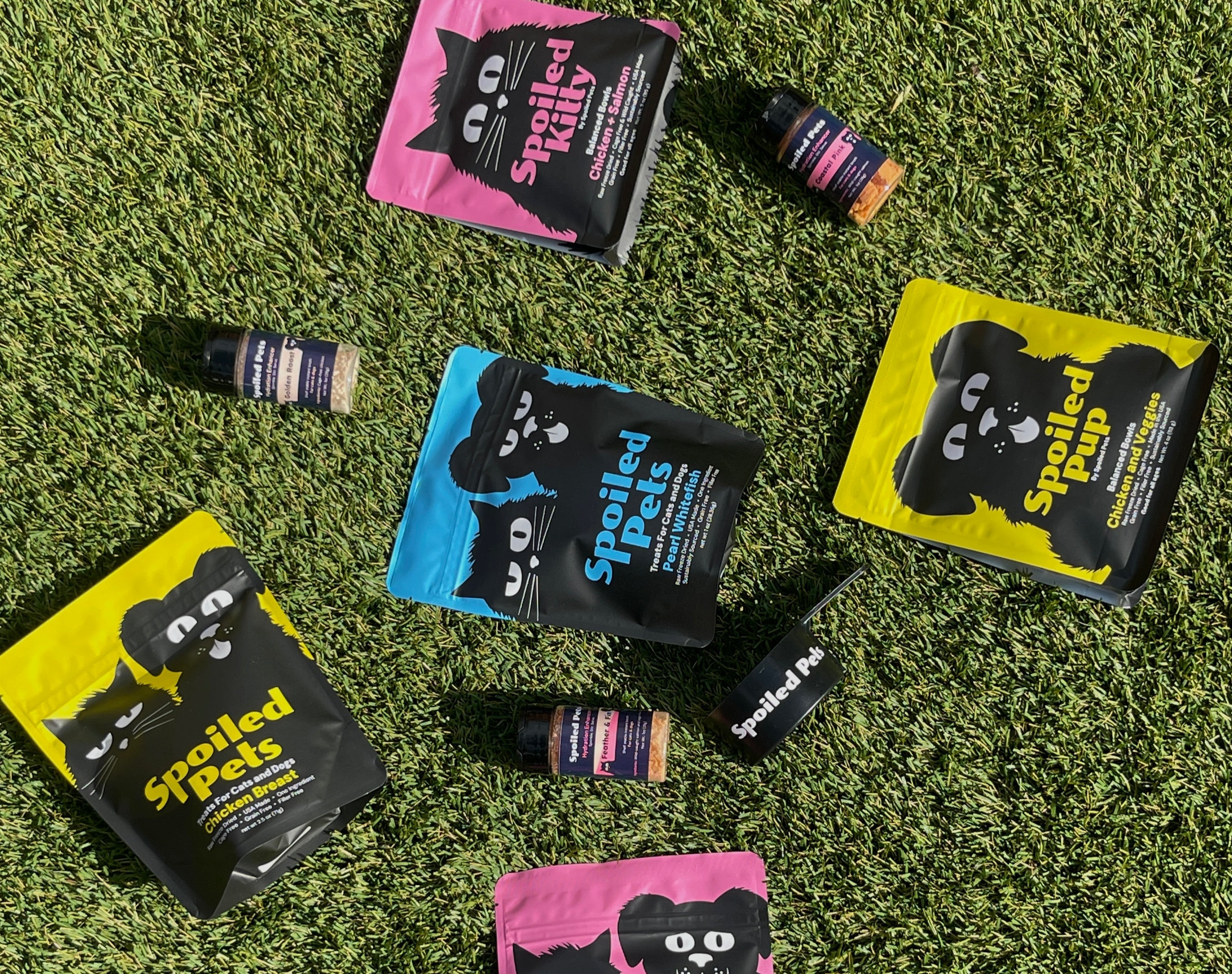 Spotted Pets product packaging on grass